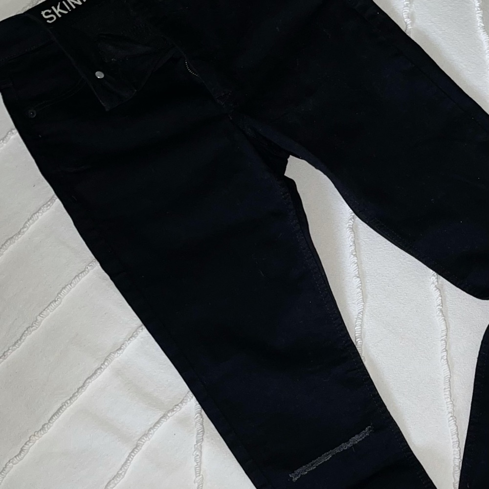 High-Waisted Ripped Skinny Jeans